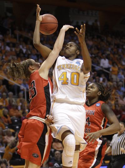 Tennessee’s Shekinna Stricklen loses control of the ball as she drives. (Associated Press)