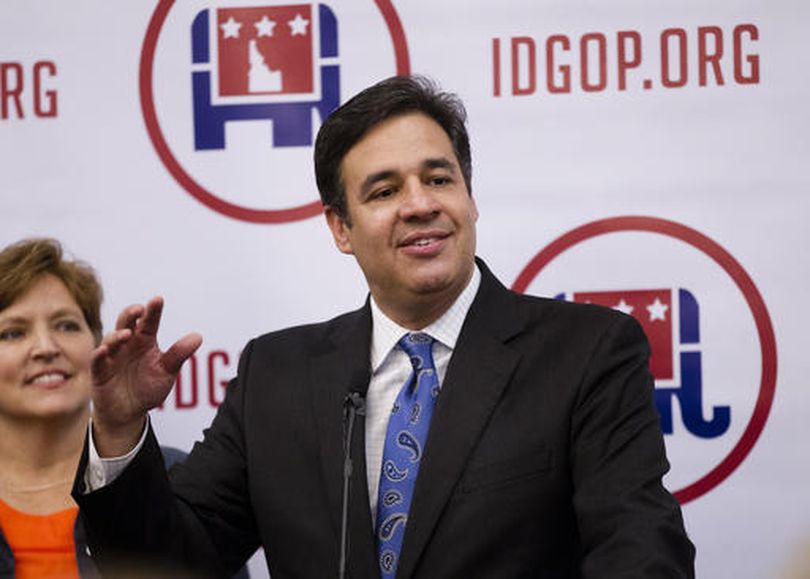 Idaho Rep. Raul Labrador, with wife Becca, addresses supporters Tuesday night in Boise (AP / Otto Kitsinger)