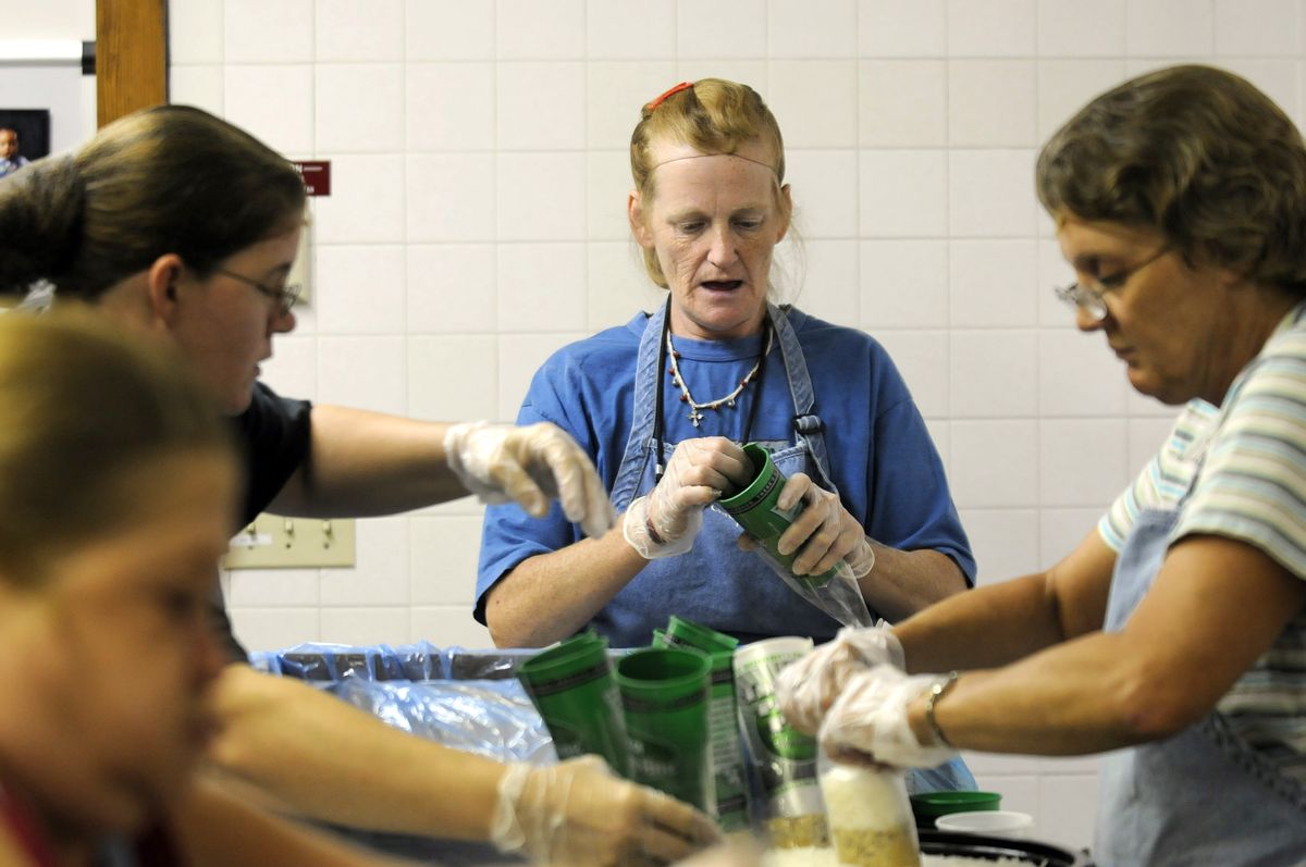 Lori Smith, a kitchen worker at Christ Kitchen, says her co-workers are like family to her. (Dan Pelle / The Spokesman-Review)