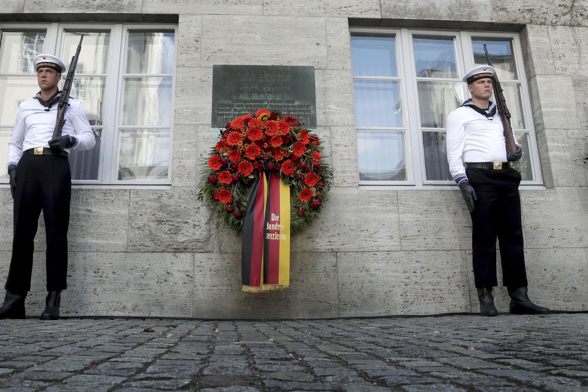 Honor guards stand next to a wreath during a memorial event at the Defence Ministry in Berlin, Germany, Saturday, July 20, 2019. On July 20, 2019 Germany marks the 75th anniversary of the failed attempt to kill Hitler in 1944. (Michael Sohn / AP)