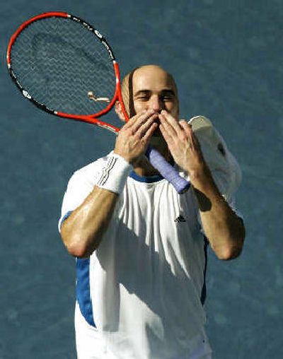 
Andre Agassi greets the crowd after reaching the final. 
 (Associated Press / The Spokesman-Review)