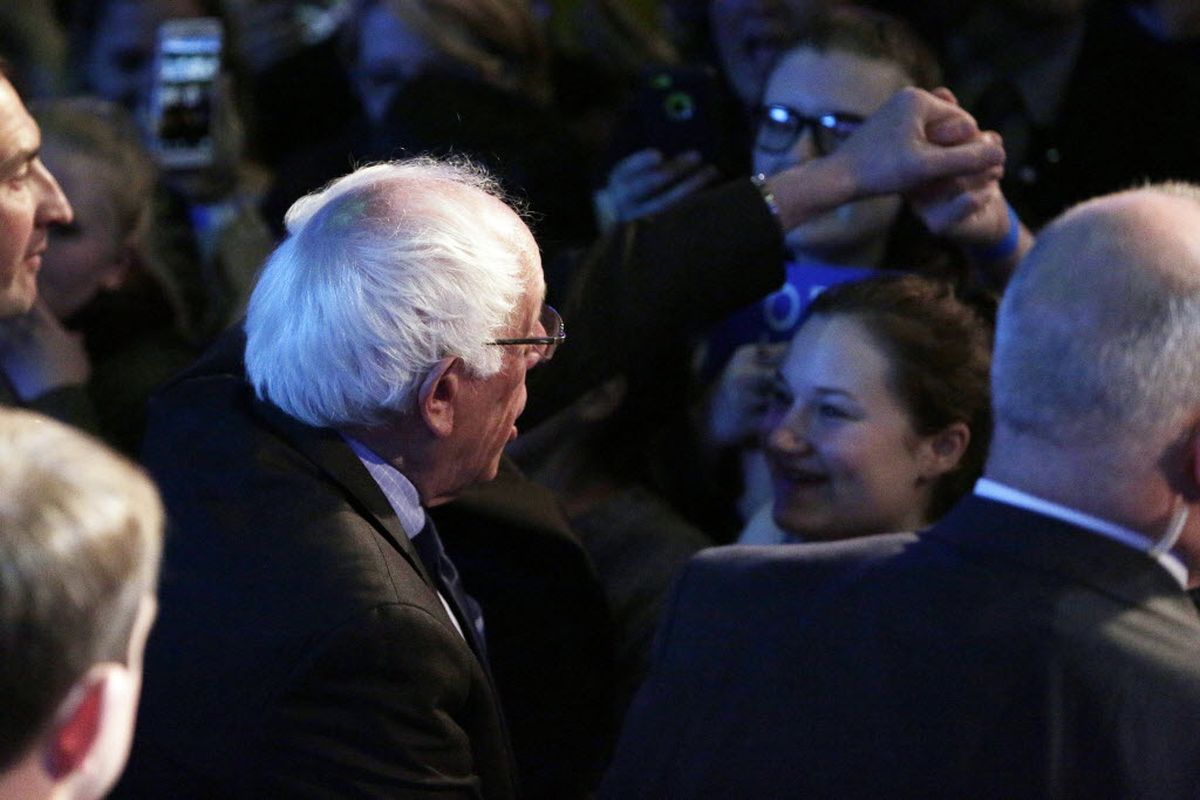 Democratic presidential candidate Sen. Bernie Sanders, I-Vt., left, speaks with a supporter at a campaign rally in Spokane this afternoon. (AP Photo/Young Kwak)