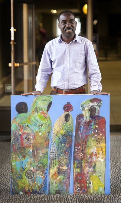 Adam Henawy, from Sudan, creates art that reflects the Sudanese culture, Darfur folklore and the ongoing conflict of the region. (Dan Pelle)