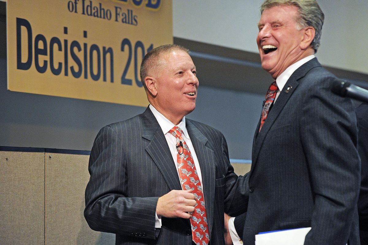 Republican Incumbent C.L. “Butch” Otter, right, and Democratic Challenger AJ Balukoff laugh as they compliment each other