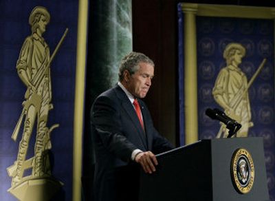 
President Bush pauses as he speaks at the National Guard Memorial Building in Washington on Thursday. 
 (Associated Press / The Spokesman-Review)