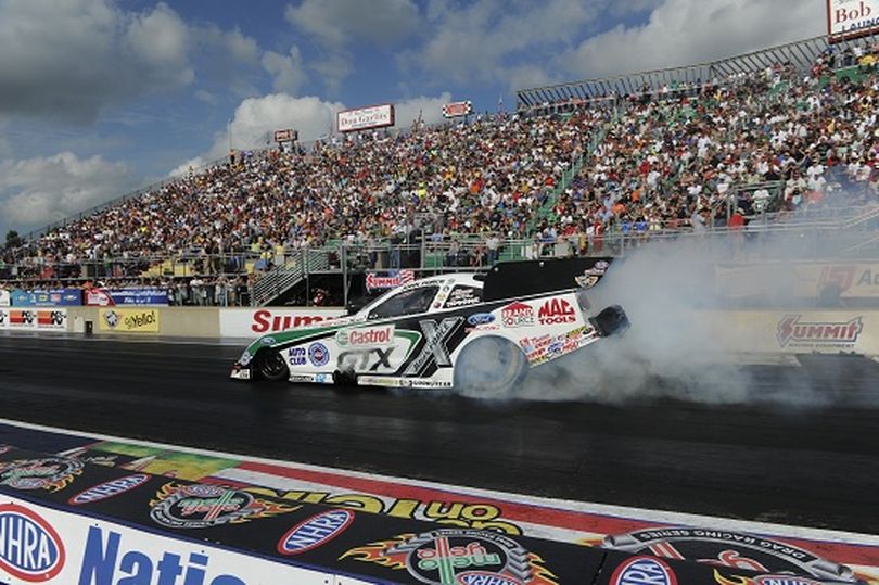 John Force earned the top qualifying spot in Funny Car competition after the first round in Norwalk, OH. Force gave a lot of credit to crew chief Mike Neff, who was the Funny Car winner at Norwalk in 2012. (Photo courtesy of NHRA)