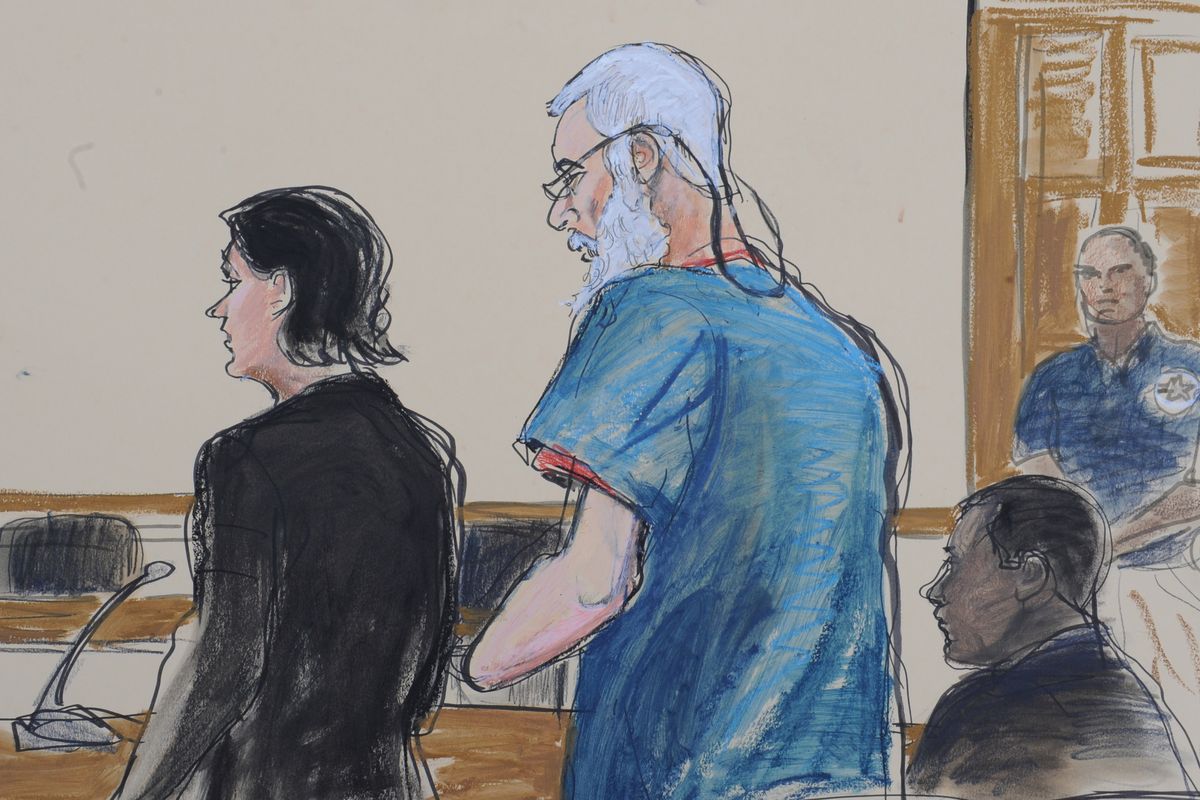 In this courtroom drawing, defense attorneys Sabrina Shroff and Jerrod Thompson Hicks represent accused terrorist Abu Hamza al- Masri, center, before Magistrate Judge Franklin Maas in Manhattan federal court in New York on Saturday, Oct. 6, 2012. Abu Hamza al-Masri, entered no plea to charges of conspiring with Seattle men to set up a terrorist training camp in Oregon and of helping abduct 16 hostages, two of them American tourists, in Yemen in 1998. (Elizabeth Williams / Associated Press)