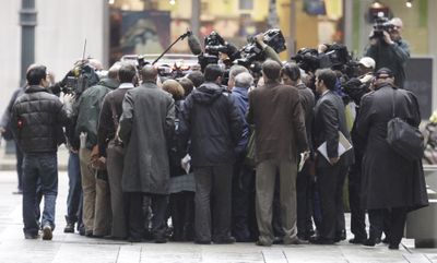 Rod Blagojevich is surrounded by media Tuesday while leaving federal court in Chicago.  (Associated Press / The Spokesman-Review)