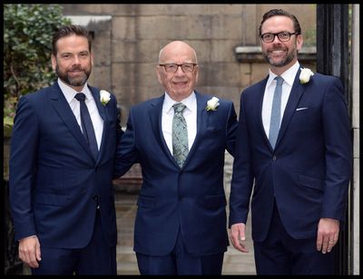 Rupert Murdoch arrives flanked by his sons Lachlan, left, and James for Rupert Murdoch and Jerry Hall’s wedding on March 5, 2016, in London.  (Andrew Parsons/Parsons Media)