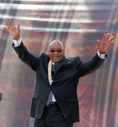 South African President Jacob Zuma, 67, waves to supporters after his swearing-in ceremony in Pretoria on Saturday.  (Associated Press / The Spokesman-Review)