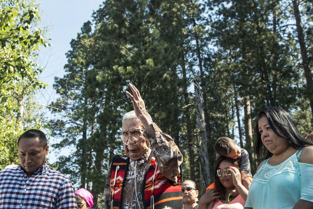 Coeur d’Alene tribe elder Felix Aripa said a prayer before the launching of their canoe made from an old-growth cedar log from Benewah Lake near Heyburn State Park on  June 7, 2016. They planned to meet up with Upper Columbia Tribe’s in Kettle Falls, Wash., on June 17. (Kathy Plonka / The Spokesman-Review)