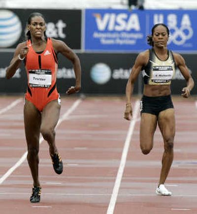 
De'Hashia Trotter, left, leads Sanya Richards in 400-meter dash. Associated Press
 (Associated Press / The Spokesman-Review)