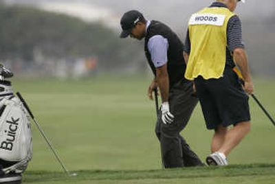 
Tiger Woods, who won the U.S. Open despite a torn ACL in his left knee, will miss the rest of season. Associated Press
 (Associated Press / The Spokesman-Review)