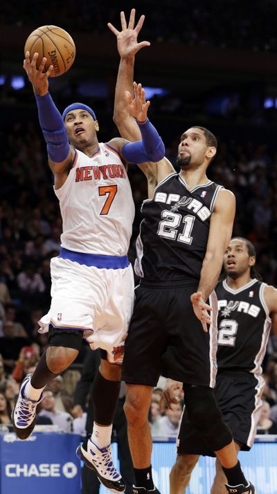 New York Knicks forward Carmelo Anthony scored 13 points in the first half to lead the Knicks to victory over the visiting Spurs. (Associated Press)