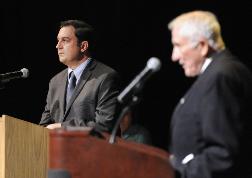 City Council president candidates Ben Stuckart, left, and John Ahern, right, debate at the candidate debates held by the Chase Youth Commission Wednesday, Oct. 7, 2015 at North Central High School. (Jesse Tinsley / The Spokesman-Review)