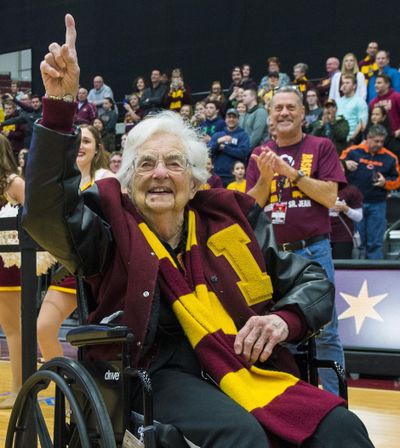 In this March 25, 2018, file photo, Sister Jean Dolores-Schmidt, chaplain of the Loyola-Chicago basketball team, gestures during a rally for the team in Chicago. Sister Jean is celebrating her 99th birthday months after gaining national attention as chaplain of the team that reached the NCAA Final Four. The university held a campus party with students and school staffers Tuesday, Aug. 21, 2018. (Tyler LaRiviere / Chicago Sun-Times via AP)