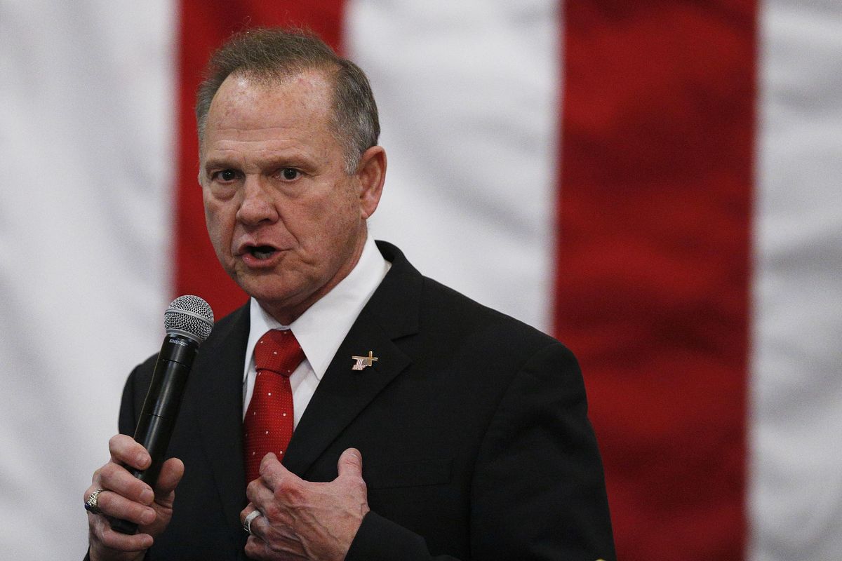 U.S. Senate candidate Roy Moore speaks at a campaign rally Dec. 11, 2017 in Midland City, Ala. Moore is going to court to try to stop Alabama from certifying Democrat Doug Jones as the winner of the U.S. Senate race. (Brynn Anderson / Associated Press)