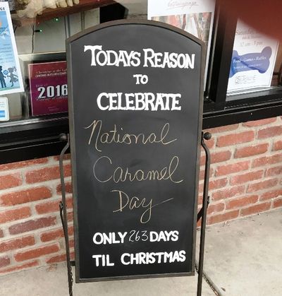 Readerboard outside Christmas at the Lake advertises National Caramel Day. (DFO/Huckleberries Online photo)