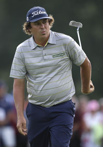 Jason Dufner didn’t miss many putts, but reacts after missing this birdie attempt at 17. (Associated Press)