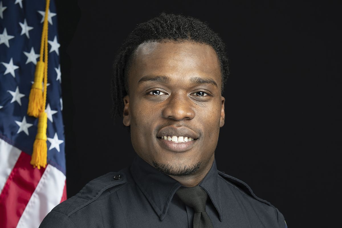 This undated photo provided by the Wauwatosa Police Department in Wauwatosa, Wis., shows Wauwatosa Police Officer Joseph Mensah. In a report released Wednesday Oct. 7, 2020, an independent investigator recommended officials in the Milwaukee suburb fire Mensah, who has shot and killed three people in the last five years. (Gary Monreal/Monreal Photography LLC)