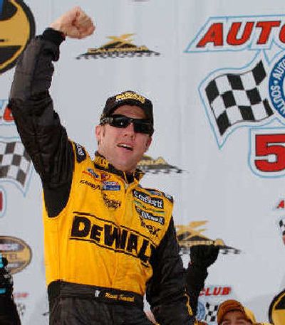 
Matt Kenseth celebrates his victory in the NASCAR Auto Club 500 at California Speedway. 
 (Associated Press / The Spokesman-Review)