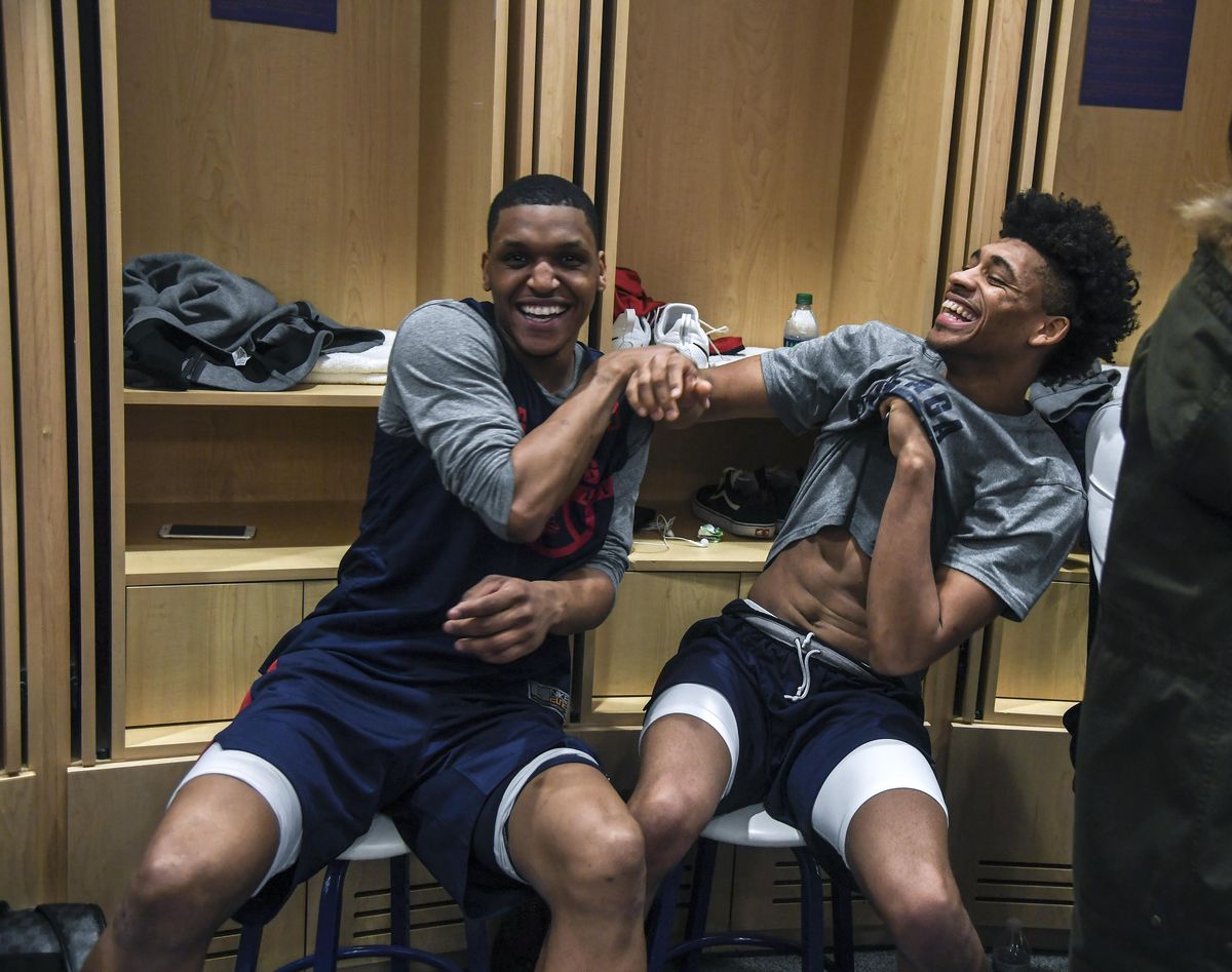 Gonzaga guard Zach Norvell Jr. and forward Jeremy Jones clown around in the locker room, Friday, March 16, 2018, in the Taco Bell Arena. The Zags are preparing to play Ohio State in the NCAA Second Round on Saturday. (Dan Pelle / The Spokesman-Review)