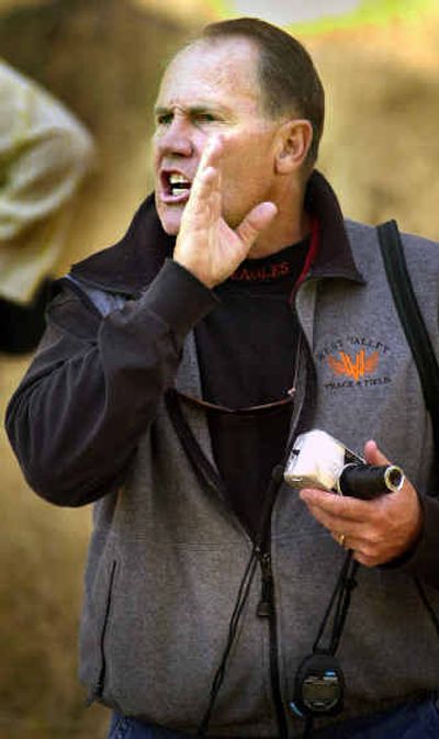 
WV cross country coach Jim McLachlan yells to a runner at a meet  a few years ago. McLachlan was diagnosed with Stage 2 melanoma in his left eye. The eye was removed and he will be fitted with a prosthetic eye later this month. WV cross country coach Jim McLachlan yells to a runner at a meet  a few years ago. McLachlan was diagnosed with Stage 2 melanoma in his left eye. The eye was removed and he will be fitted with a prosthetic eye later this month. 
 (File/File/ / The Spokesman-Review)