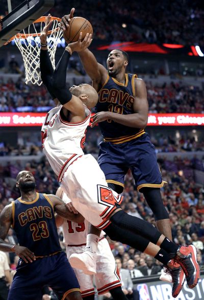 Tristan Thompson, right, and the Cleveland Cavaliers rejected Chicago’s attempt at a Game 7, advancing in the NBA playoffs. (Associated Press)