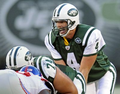 Couch Slouch sees nothing good for Brett Favre as a New York Jet.  (Associated Press / The Spokesman-Review)