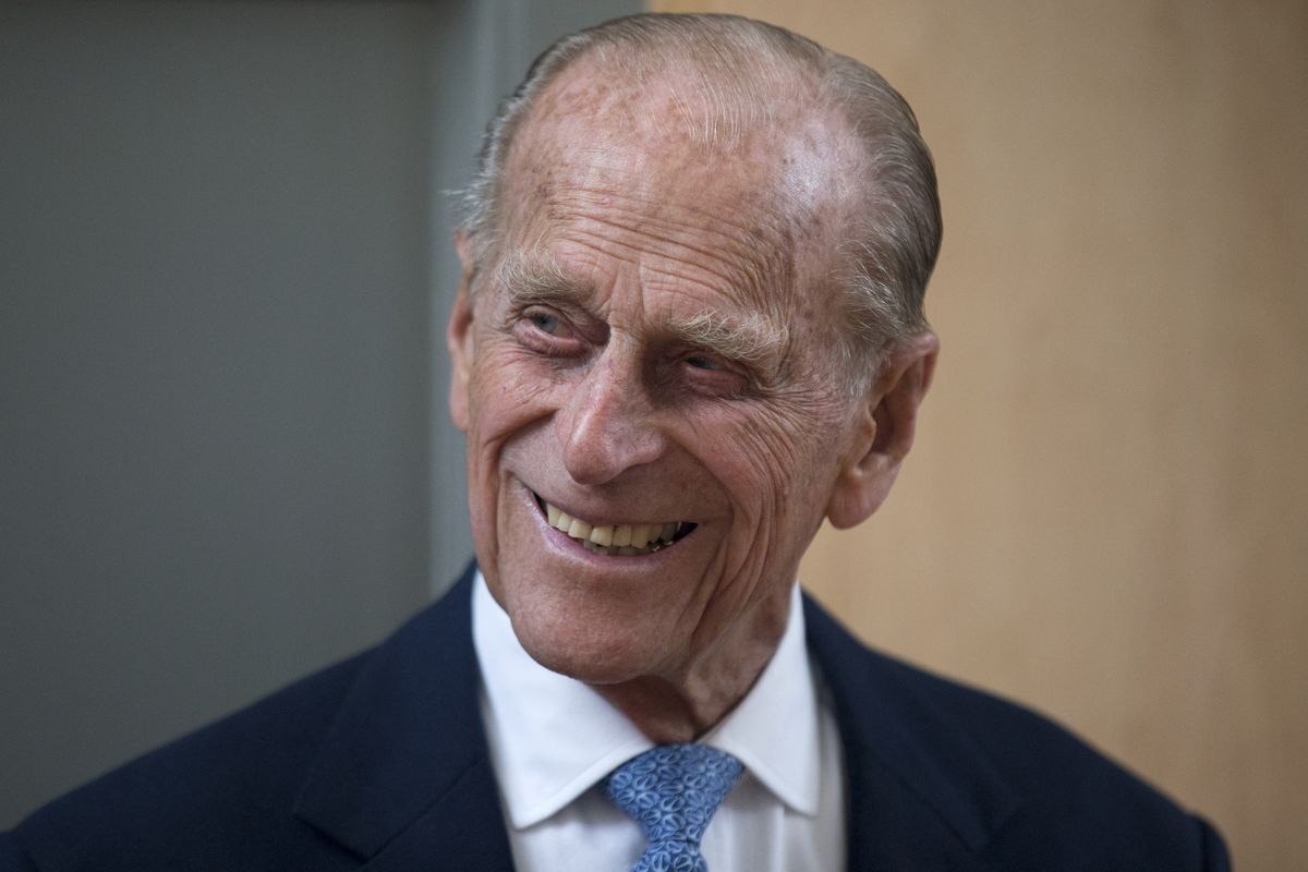 FILE - In this June 8, 2015 file photo Britain's Prince Philip, the husband of Queen Elizabeth II, smiles after unveiling a plaque at the end of his visit to Richmond Adult Community College in Richmond, south west London. Prince Philip, the irascible and tough-minded husband of Queen Elizabeth II who spent more than seven decades supporting his wife in a role that both defined and constricted his life, has died, Buckingham Palace said Friday. He was 99.  (Matt Dunham)