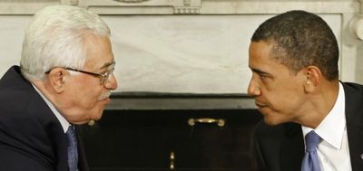President Barack Obama meets with Palestinian President Mahmoud Abbas in the Oval Office of the White House in Washington on Thursday.  (Associated Press / The Spokesman-Review)