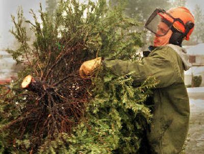 
Christmas trees can be recycled into mulch.
 (File/ / The Spokesman-Review)