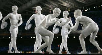 
Performers dressed as ancient Greek athletes pose during the Opening Ceremony of the 2004 Olympic Games at the Olympic stadium in Athens.
 (Associated Press / The Spokesman-Review)