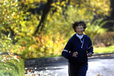 
Sister Madonna Buder takes a training run along the Spokane River near her Spokane home.
 (Jed Conklin / The Spokesman-Review)