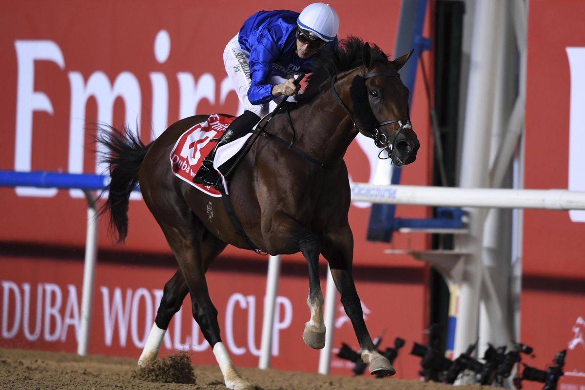 Jockey Christophe Soumillon reacts aboard Godolphin’s Thunder Snow as he crosses the wire to win the $10 million Group 1 Dubai World Cup in the United Arab Emirates, Saturday, March 31, 2018. (Martin Dokoupil / Associated Press)