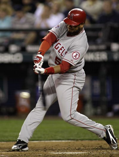 Los Angeles Angels' Bobby Abreu hits a solo home run in the sixth inning of a baseball game against the Seattle Mariners, Monday, Aug. 30, 2010, in Seattle. (Associated Press / Associated Press)