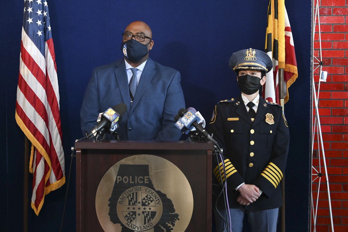 Baltimore County Police Col. Andre Davis, left, and Police Chief Melissa Hyatt are shown at a news conference in Baltimore County on Monday, March 29, 2021. Investigators have “no idea” why a Maryland man fatally shot his parents at their home and gunned down two other people at a convenience store before setting fire to his apartment and killing himself, a police official said Monday. A gun that Joshua Green, 27, used in Sunday