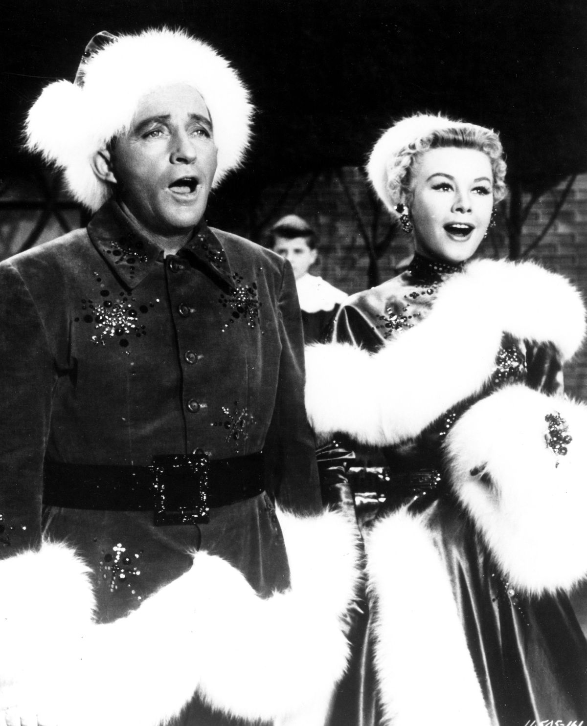 Singer and actor Bing Crosby and actor and dancer Vera-Ellen appear in a scene from 1954’s “White Christmas.” (Michael Ochs Archives)