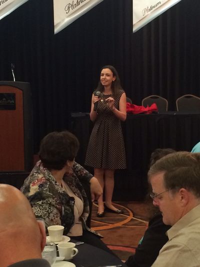 Newly appointed president and CEO of the Greater Spokane Valley Chamber of Commerce Katherine Morgan greets chamber guests at a breakfast meeting on Sept. 19, 2014 (Pia Hallenberg )
