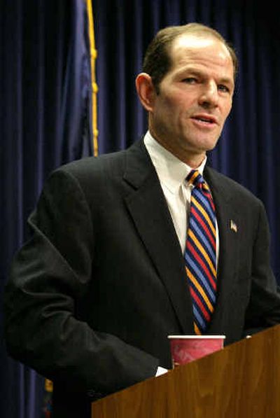
Attorney General Eliot Spitzer speaks during a news conference Thursday, in which he announced he was suing the insurance brokerage firm Marsh & McLennan Companies.
 (Associated Press / The Spokesman-Review)