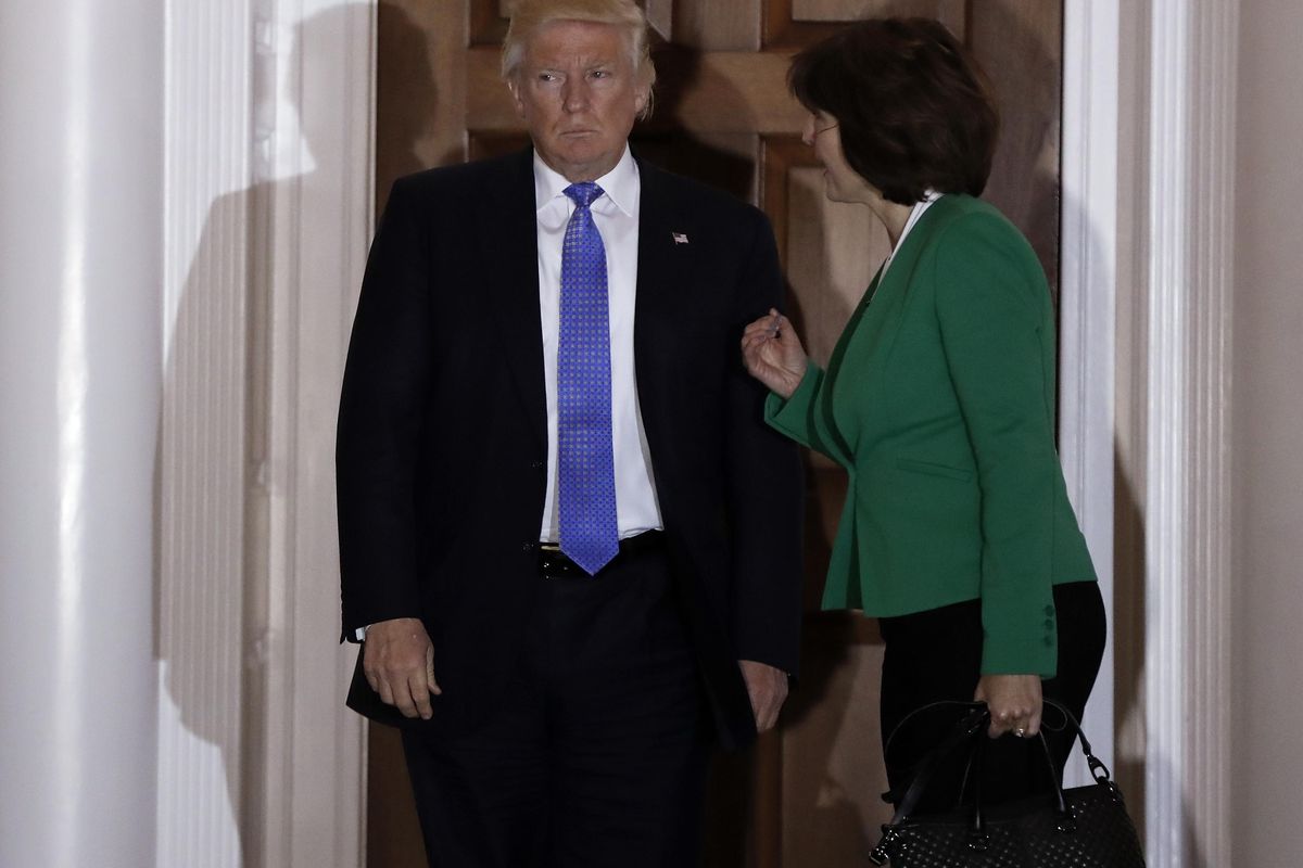 President-elect Donald Trump stands left as Rep. Cathy McMorris Rodgers, R-Wash., speaks to him a she leaves the Trump National Golf Club Bedminster clubhouse, Sunday, Nov. 20, 2016, in Bedminster, N.J. (Carolyn Kaster / Associated Press)