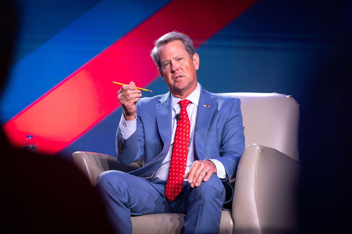 Georgia Gov. Brian Kemp, holding a pencil as a prop during his appearance at the Gathering political conference in Atlanta