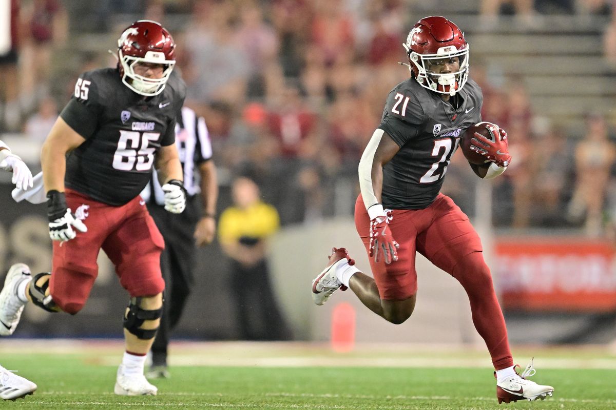 Washington State Cougars running back Wayshawn Parker (21) runs the ball for a touchown during the first half of a college football game on Saturday, Sep. 7, 2024, at Gesa Field in Pullman, Wash. WSU led 27-10 at the half.  (Tyler Tjomsland/The Spokesman-Review)