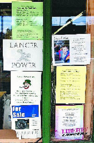 
The window of Kelley's Thrift in Fairfield acts as a bulletin board for townspeople to share messages. 
 (The Spokesman-Review)