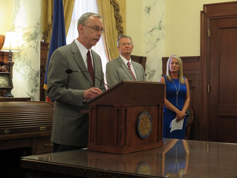 Idaho Lottery Director Jeff Anderson, left, discusses the lottery’s earnings for the state in the just-completed fiscal year at a news conference in the governor’s office on July 6, 2017. At right are Lt. Gov. Brad Little and state schools Superintendent Sherri Ybarra. (Betsy Z. Russell)
