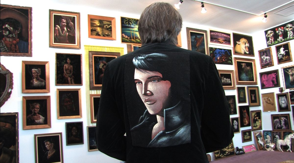 Carl Baldwin wears a velvet jacket while making his way through the Velveteria Museum of Velvet Paintings. Associated Press photos (Associated Press photos / The Spokesman-Review)