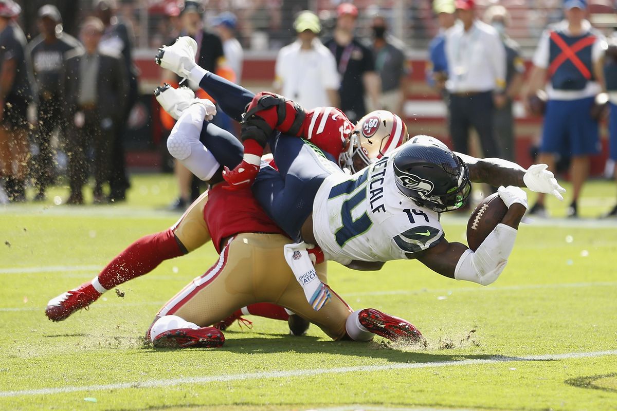 Wilson's 3 TDs lead Seahawks past 49ers 28-21