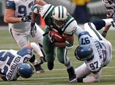 
Jets running back Curtis Martin has not missed a game since 1998.
 (Associated Press / The Spokesman-Review)