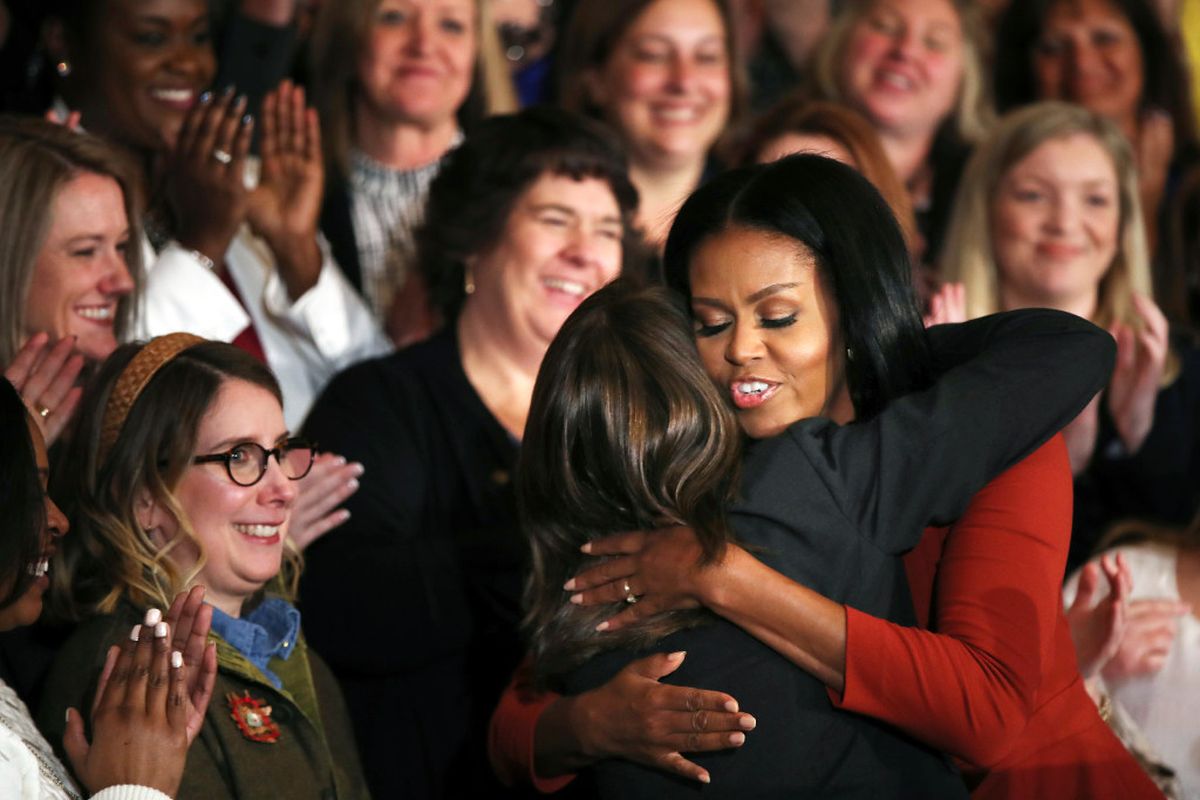 First lady Michelle Obama hugs 2017 School Counselor of the Year Terri Tchorzynski, after her final speech as First Lady at the 2017 School Counselor of the Year ceremony in the East Room of the White House in Washington, Friday. The woman smiling immediately to the left and behind the First lady and Tchorzynski is Jeralyn Mire of Sandpoint, Idaho