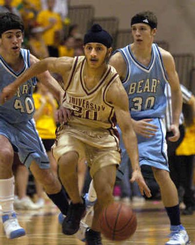 University High's Gil Inderbir dribbles down the court during the Stinky Sneaker game against Central Valley Jan. 14.
 (File/ / The Spokesman-Review)